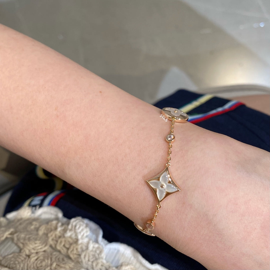 [vivabelle]STAR AND SUN 4 MOTIF WHITE MOP PINK GOLD BRACELET